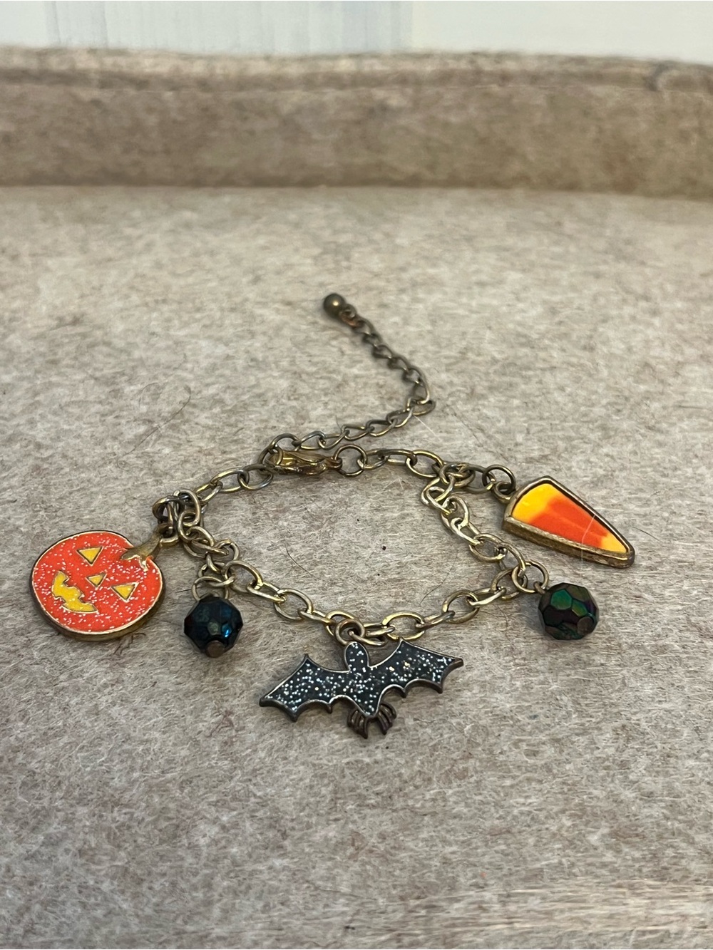 Adorable Halloween charm bracelet! With pumpkin, candy corn, and bat charms
